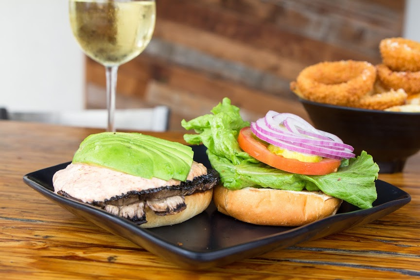 Opened burger with meat, cheese and salad